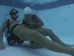 Underwater mastrubation with dildo